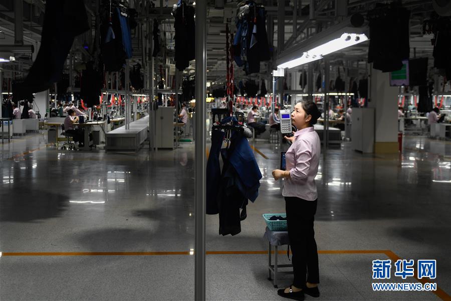 (壯麗70年·奮斗新時(shí)代·圖文互動(dòng))(1)“用心的作品是有靈魂的”——從“紅幫裁縫”到服裝名城