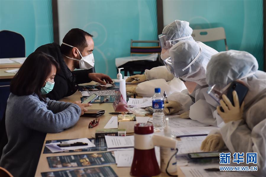 (聚焦疫情防控)(1)北京新國展入境人員轉(zhuǎn)運集散地見聞