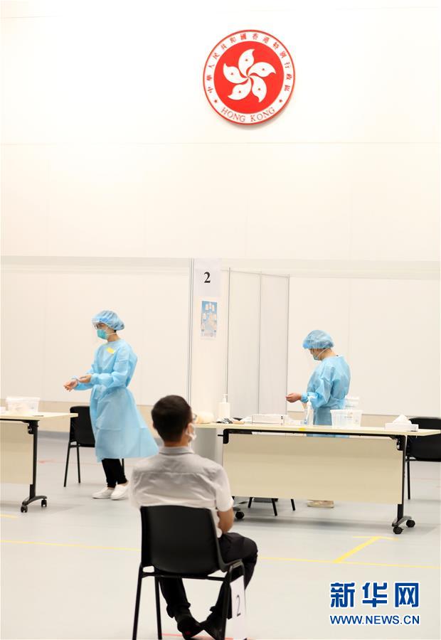 （圖文互動(dòng)）（2）特寫：新冠病毒普檢首日，香港市民踴躍參與
