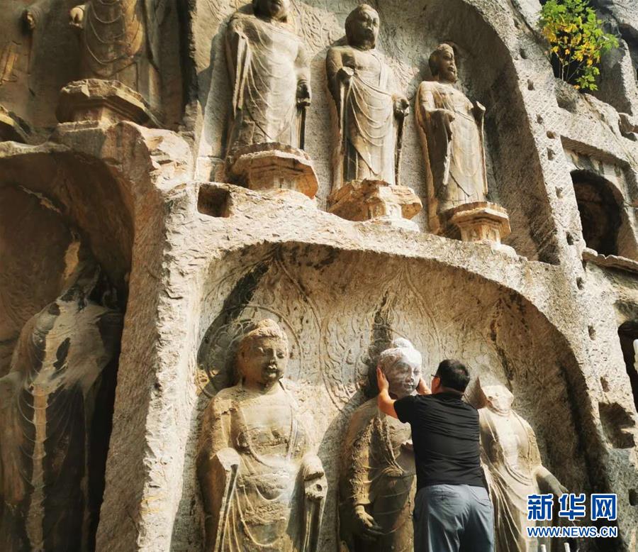 （圖文互動(dòng)）（4）合體了，龍門石窟流散佛首首次實(shí)現(xiàn)“數(shù)字復(fù)位”