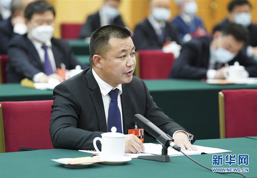 （新華全媒頭條·圖文互動(dòng)）（11）從人民中汲取磅礴力量——習(xí)近平總書記同出席2020年全國(guó)兩會(huì)人大代表、政協(xié)委員共商國(guó)是紀(jì)實(shí)