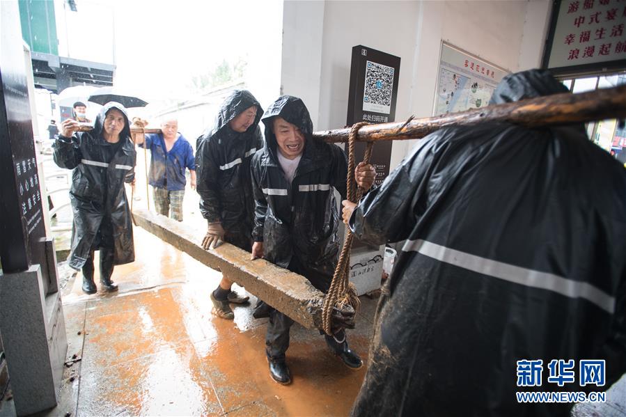 （在習(xí)近平新時(shí)代中國(guó)特色社會(huì)主義思想指引下——新時(shí)代新作為新篇章·習(xí)近平總書記關(guān)切事·圖文互動(dòng)）（4）戰(zhàn)疫魔,斗洪魔——湖北全力應(yīng)對(duì)防疫、防汛疊加“雙考”