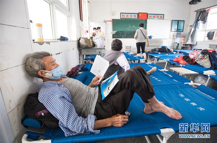 （在習(xí)近平新時(shí)代中國(guó)特色社會(huì)主義思想指引下——新時(shí)代新作為新篇章·習(xí)近平總書記關(guān)切事·圖文互動(dòng)）（5）戰(zhàn)疫魔,斗洪魔——湖北全力應(yīng)對(duì)防疫、防汛疊加“雙考”