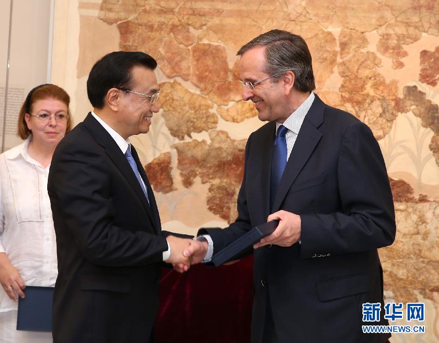 6月21日，國(guó)務(wù)院總理李克強(qiáng)與希臘總理薩馬拉斯共同出席希臘伊拉克利翁博物館新館開(kāi)館儀式并發(fā)表講話。 新華社記者 龐興雷 攝