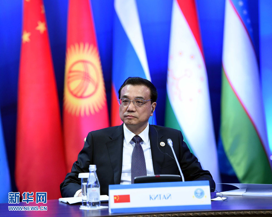 12月15日，中國國務(wù)院總理李克強(qiáng)在阿斯塔納出席上海合作組織成員國政府首腦理事會第十三次會議。 新華社記者 饒愛民 攝