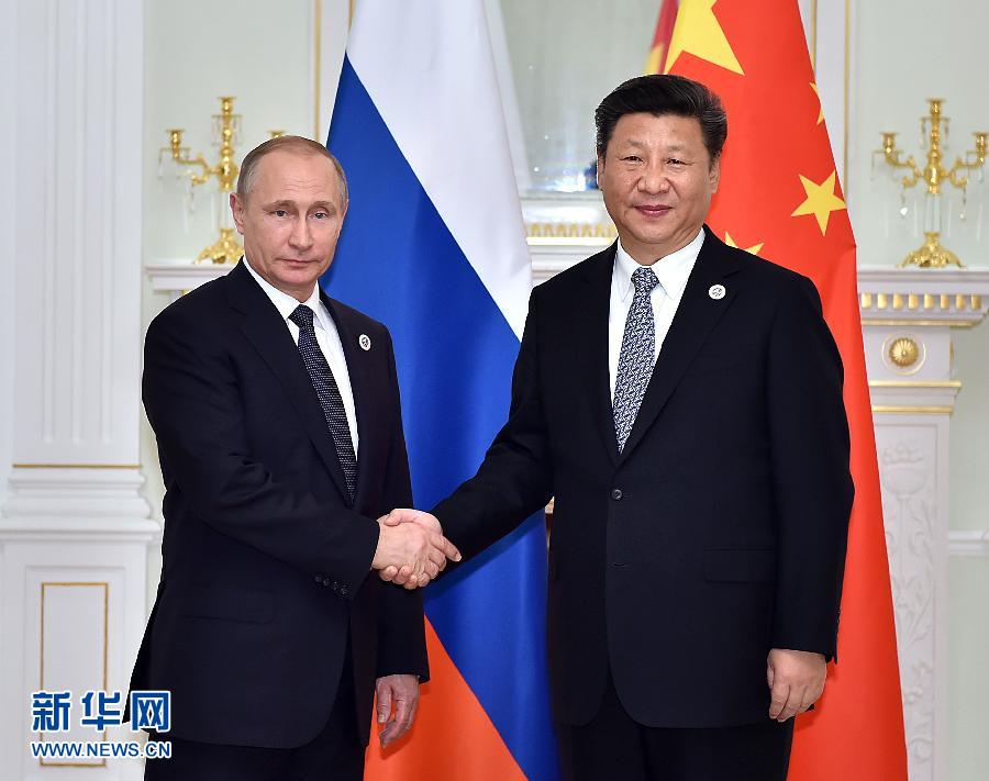 6月23日，國家主席習(xí)近平在烏茲別克斯坦塔什干會見俄羅斯總統(tǒng)普京。新華社記者李濤攝