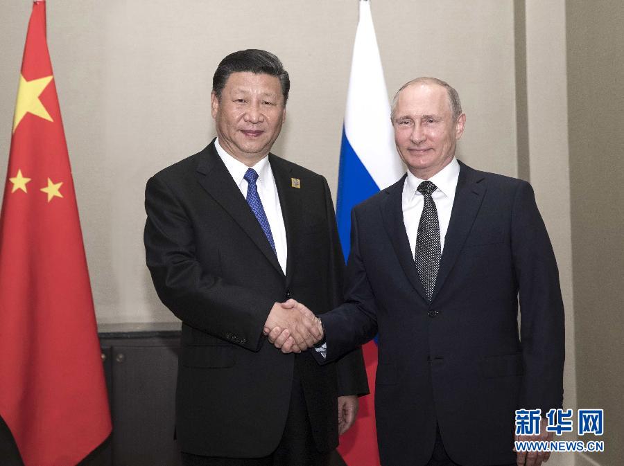 6月8日，國家主席習(xí)近平在阿斯塔納會(huì)見俄羅斯總統(tǒng)普京。 新華社記者蘭紅光 攝