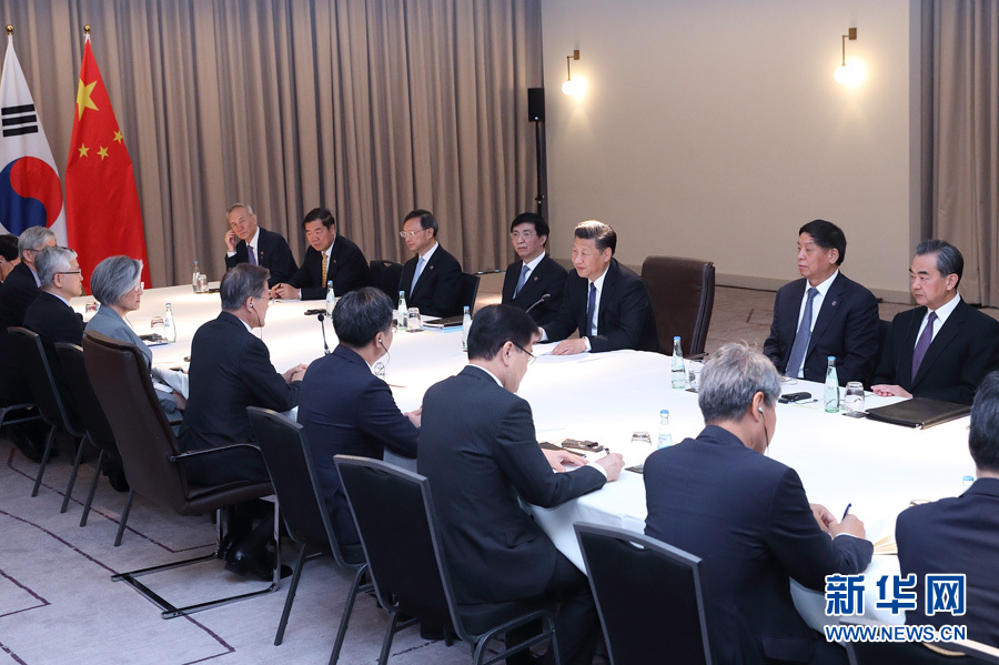 7月6日，國家主席習(xí)近平在柏林會見韓國總統(tǒng)文在寅。 新華社記者 王曄攝